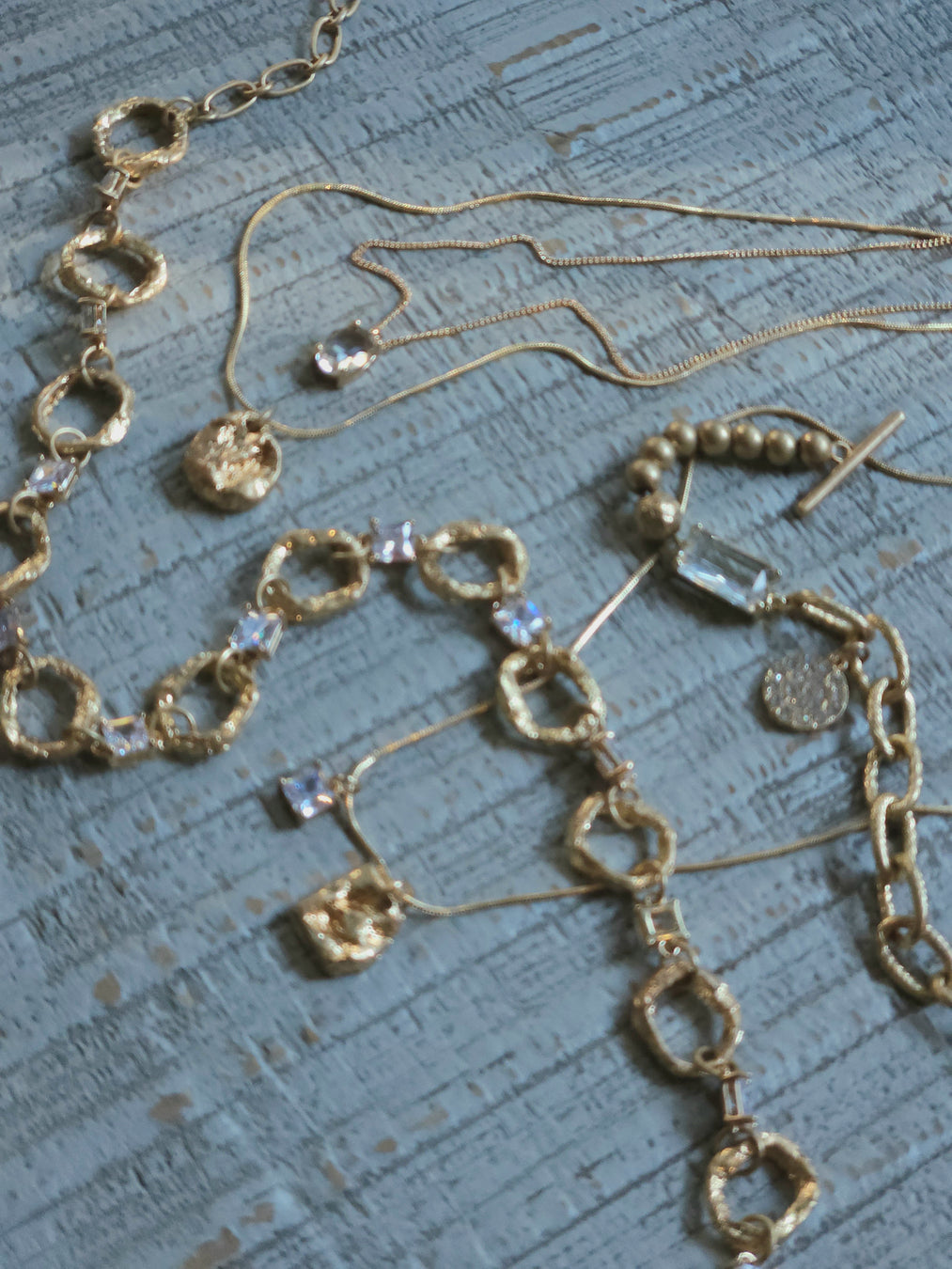 Fashion Jewelry Made of Textured Metals and Crystals